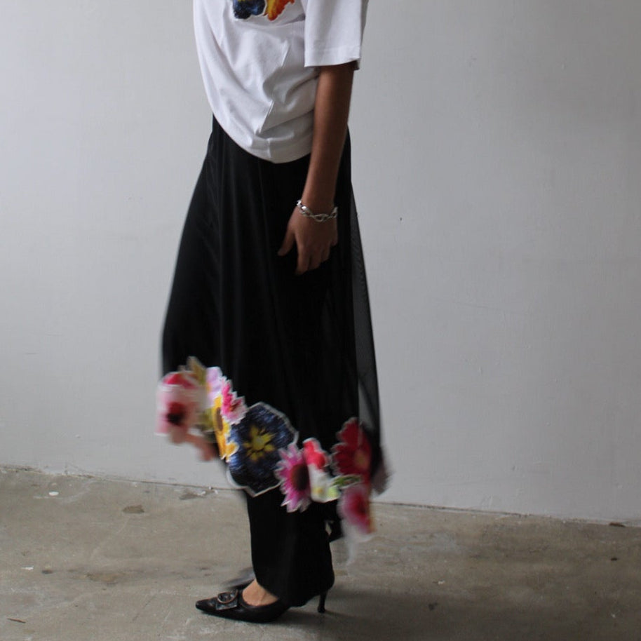 Sheer black stickerbook skirt